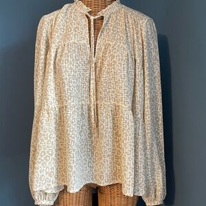 On 34th EUC Animal Print Boho Top. Size M. 100% recycled polyester. Ruffles.